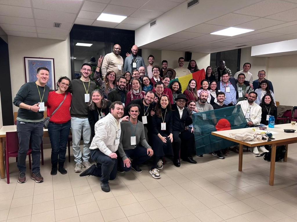 Photo of a large group of Economy of Francesco Hub coordinators from global EoF hubs